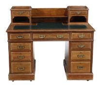 A Victorian walnut pedestal desk, circa 1870, the rectangular top with leather inset, above an