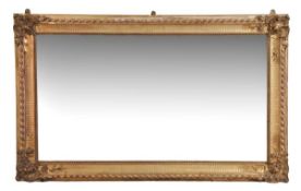 A William IV gilt composition mirror, circa 1835, of rectangular form, 142cm high, 88cm wide
