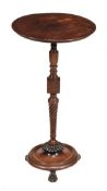 A Regency mahogany occasional table, circa 1815, the circular top above a turned and wrythen