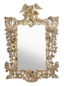 A carved giltwood framed wall mirror in George III style, 19th century, in the manner of Thomas