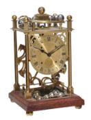 A brass ‘Spherical Weight Clock’, Harding and Bazeley, Cheltenham, late 20th century, the circular