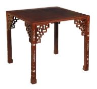 An Oriental table with mop inlay, early 20th century plus four oriental corner chairs with mop