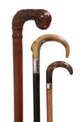 A Victorian tortoiseshell and gilt metal mounted stained hardwood walking stick, late 19th