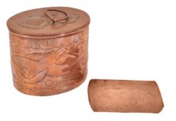 A Newlyn copper tea caddy and cover, hammered in low relief with sharks swwimming, the cover with