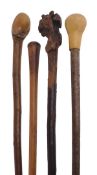 A stained hardwood, possibly Scottish laburnum walking stick, late 19th century, the tapering grip c