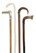 A horn mounted beech walking stick, early 20th century, the curved handle with moulded thumbrest,