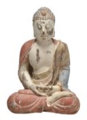 A Chinese wood figure of a Buddha, seated with crossed legs and hands, the chest bared, clothes in t