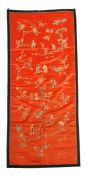 A Chinese commemorative red silk panel, 19th century, of rectangular shape embroidered with the