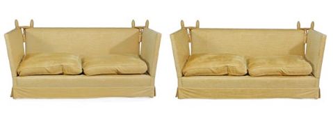 A pair of modern upholstered sofas, in Knole style, of recent manufacture, each of typical form,