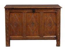 A cedar coffer, early 18th century, the hinged rectangular top opening to a plain interior, above a