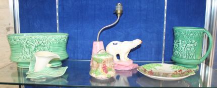 An Art Deco Flosmaron lamp stylised as a polar bear on iceberg, a Falcon Ware Cottage Garden