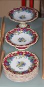 A Victorian pottery part dessert service with printed and coloured foliate decoration