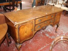 A Queen Anne style walnut sideboard on cabriole supports, early 20th Century 168cm wide