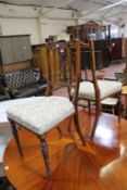 A pair of Edwardian rosewood and inlaid side chairs. Best Bid