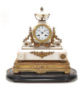 A French gilt brass mounted white marble mantel clock, late 19th century, the eight-day count wheel