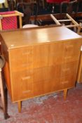 A 1960`s teak four drawer chest 84cm wide