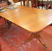 A Regency style mahogany twin pedestal dining table 214cm length