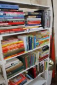 [BOOKS] Miscelleaneous held on four shelves to include cars, childrens.  Best Bid