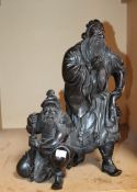 A carved wooden Chinese figural group; 44.5cm high