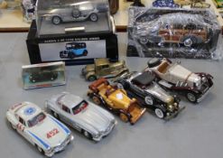 An extensive quantity of mixed diecast cars of various makes and models, together with a display