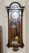 A German walnut Vienna style wall clock, late 19th century, the eight-day twin weight gong striking