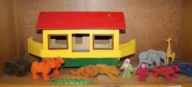 A childs polychrome painted wooden Noah`s Ark set with animals Best Bid