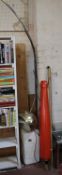 A contemporary standard lamp, a red parasol and a chrome table, and a snakehead crook (sold as