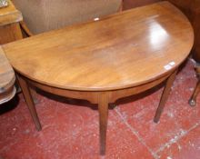 A 19th Century mahogany demi lune side table 115cm wide  Best Bid