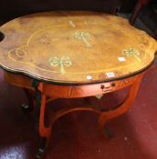 A 19th century yew wood work table with a frieze drawer on shaped supports 86cm wide