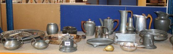 A quantity of pewter including plates, teapots, dishes and a Charles Rennie Mackintosh designed