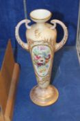 A Royal Worcester blush ground vase, reputedly painted with flowers in an oval reserve by Ernest