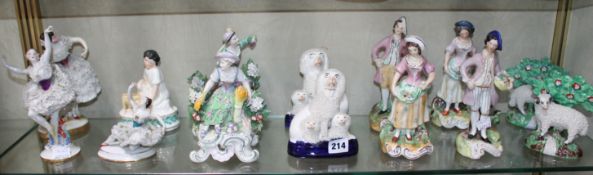A group of mixed ceramic figures including four 20th Century Staffordshire figures, a pair of