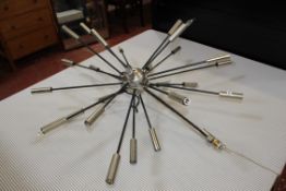 A contemporary twenty five branch sputnik hanging light 122cm diameter (sold as parts)