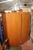 A 1960`s teak two door wardrobe 119cm wide