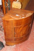 A 19th Century mahogany corner cupboard with central cupboard and drawer 79cm high, 68cm wide and a