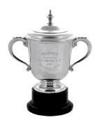 The Brompton Perpetual Challenge Cup, a silver twin handled trophy cup and...  The Brompton