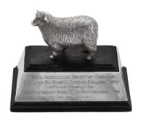 The Alfred Day Memorial Challenge Trophy, a silver figure of a sheep by...  The Alfred Day