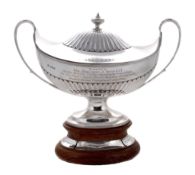 The Mallinson Trophy, a silver oval twin handled soup tureen and cover by...  The Mallinson