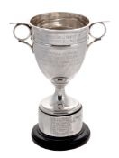 The Dugdale Perpetual Silver Trophy, a silver twin handled small cup by...  The Dugdale Perpetual