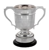 The Laird Perpetual Challenge Cup, a silver twin handled trophy cup  The Laird Perpetual Challenge