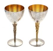 Two silver parcel gilt wine goblets by Stuart Devlin, London 1977 and 1979  Two silver parcel gilt