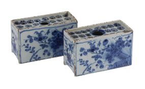 A pair of English Delft blue and white flowerbricks, probably Liverpool  A pair of English Delft