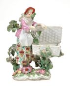 A Derby porcelain model of a flower-seller, circa 1755  A Derby porcelain model of a flower-seller