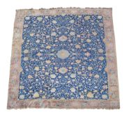 A Tabriz Hunting Carpet, the indigo field with a central pale blue medallion...  A Tabriz Hunting