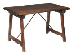 A Spanish walnut writing table, late 17th Century with a rectangular moulded...  A Spanish walnut