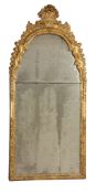 A George I carved giltwood wall mirror, circa 1720  A George I carved giltwood wall mirror,   circa