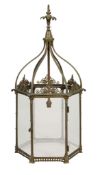 A near pair of George III brass and glazed hall lanterns  A near pair of George III brass and