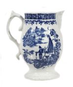 A Liverpool blue and white baluster jug, circa 1780, with mask spout  A Liverpool (probably