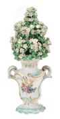 A Derby model of an urn issuing flowers, circa 1770, modelled en rocaille , 22  A Derby model of an