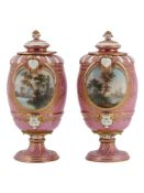 A pair of Sevres style pink ground jewelled vases and covers, 19th century  A pair of Sevres style